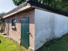 Bild... Freier Blick: Gem�tlicher Backsteinbau mit S�dterrasse - Solaranlage - Sauna....